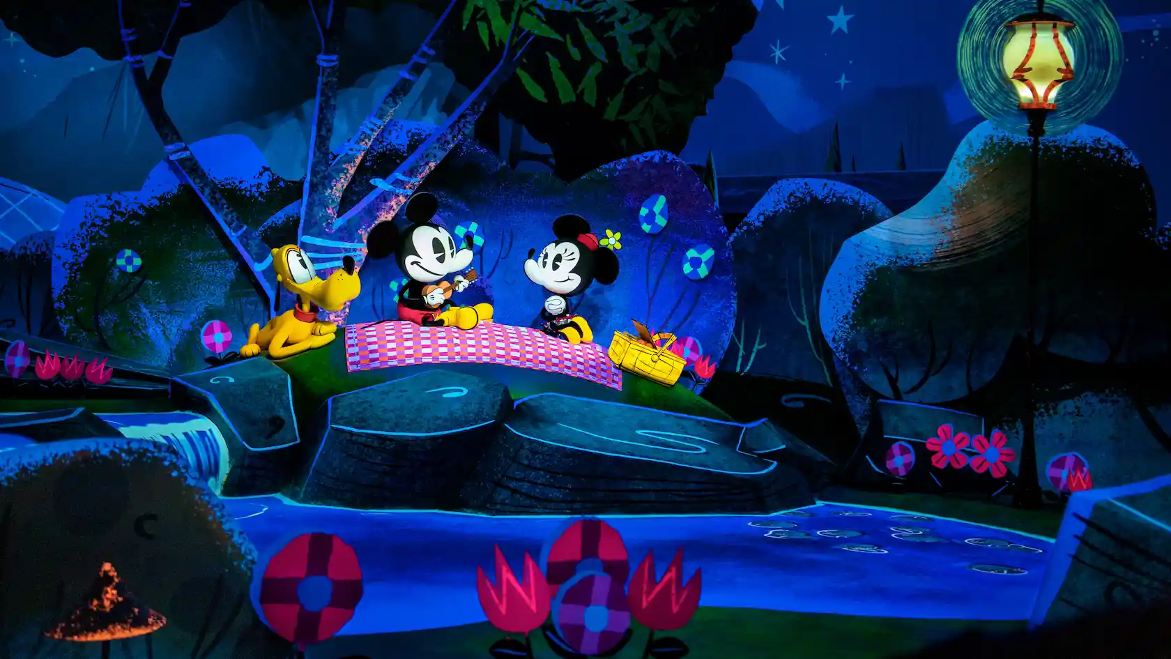 Mickey, Minnie and Pluto having a picnic