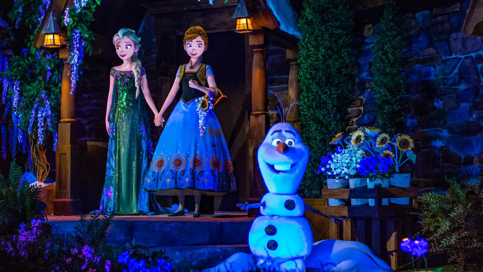 Elsa, Anna and Olaf in the Frozen ride at Epcot