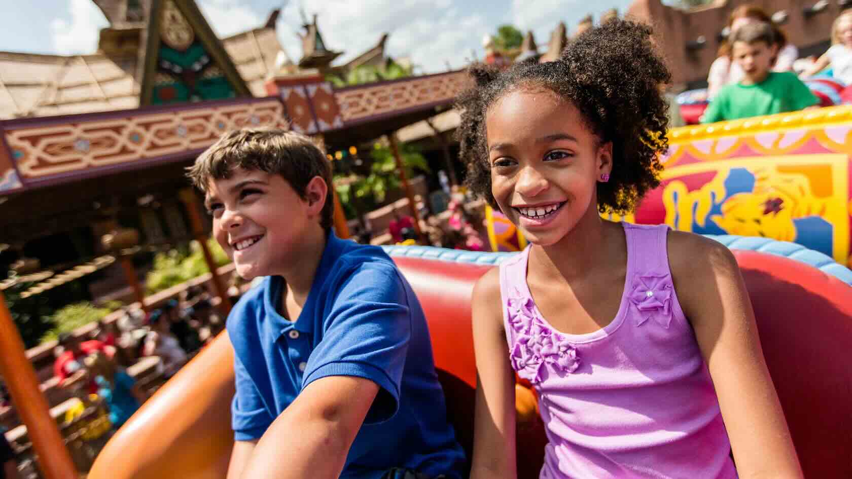 Two kids on Aladdin's magic carpet